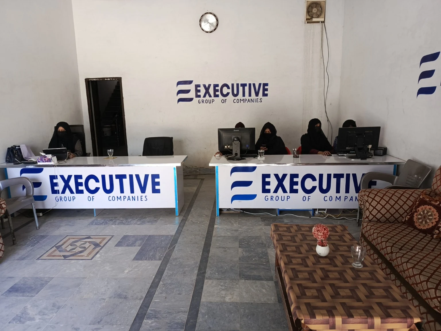 Women working at the Executive Group of Companies office